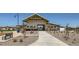 Community clubhouse featuring outdoor entertaining areas and green spaces for residents at 4073 E Amoroso Dr, Gilbert, AZ 85296