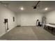 Spacious two-car garage with ample room for parking and additional storage space at 4073 E Amoroso Dr, Gilbert, AZ 85296