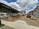 Another view of the community playground, featuring wood chips and play structure at 4073 E Amoroso Dr, Gilbert, AZ 85296