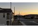 Scenic street view with mountain backdrop in a modern community at sunrise or sunset at 4073 E Amoroso Dr, Gilbert, AZ 85296