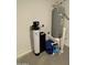 Close-up of the property's water heater, water softener, and other utility equipment at 4073 E Amoroso Dr, Gilbert, AZ 85296