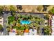 Scenic aerial view of a residential area, showcasing community pools and landscaped yards at 4203 E Hazelwood St, Phoenix, AZ 85018