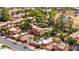 Aerial view of a community with well-manicured landscaping, swimming pool, and mature trees at 4203 E Hazelwood St, Phoenix, AZ 85018