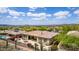 Exterior featuring a large patio perfect for outdoor dining and views of the desert landscape at 42109 N Astoria Way, Anthem, AZ 85086