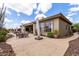 Large backyard patio with outdoor dining and gathering spaces, perfect for entertaining at 42109 N Astoria Way, Anthem, AZ 85086