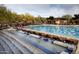Lovely community pool with many seating areas and lap lanes, creating a relaxing space to enjoy swimming and the desert views at 42109 N Astoria Way, Anthem, AZ 85086