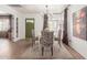 Chic dining room with modern lighting, stylish zebra-patterned chairs, and designer accents at 430 N Vineyard --, Mesa, AZ 85201