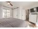 Bright main bedroom with a closet, dresser, and outdoor view at 430 N Vineyard --, Mesa, AZ 85201