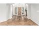 Grand entryway with tile flooring, decorative inlay, and a large front door flanked by shuttered windows at 4494 E Reins Rd, Gilbert, AZ 85297