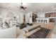 Bright and airy living room with stylish furniture, creating a comfortable and inviting space at 4494 E Reins Rd, Gilbert, AZ 85297