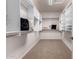 Spacious walk-in closet featuring carpet, shelving, and hanging rods at 4494 E Reins Rd, Gilbert, AZ 85297