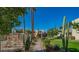 Community pool area featuring palm trees and well-maintained landscaping at 4620 N 68Th St # 166, Scottsdale, AZ 85251