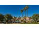 Community pool featuring lounge chairs and desert landscaping at 4620 N 68Th St # 166, Scottsdale, AZ 85251
