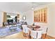 Open-concept living and dining area with stylish furniture and decor for comfortable living at 4620 N 68Th St # 166, Scottsdale, AZ 85251