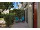 Front patio with a seating area that includes two metal chairs at 4620 N 68Th St # 166, Scottsdale, AZ 85251
