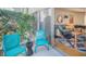 Relaxing patio with outdoor seating and a view into the stylishly decorated living room at 4620 N 68Th St # 166, Scottsdale, AZ 85251