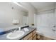 Clean bathroom featuring large mirror, single sink vanity, and bathtub with shower at 4925 E Desert Cove Ave # 326, Scottsdale, AZ 85254