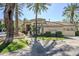 Exterior of building featuring manicured landscaping and a tile roof in a bright, sunny setting at 4925 E Desert Cove Ave # 326, Scottsdale, AZ 85254