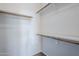 Walk-in closet with wooden railings for optimal storage at 4925 E Desert Cove Ave # 326, Scottsdale, AZ 85254