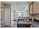 Cozy kitchen with a breakfast bar overlooking the living area and natural light at 4925 E Desert Cove Ave # 326, Scottsdale, AZ 85254