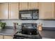 Close up of a kitchen featuring modern appliances, countertop decor, and ample counter space at 4925 E Desert Cove Ave # 326, Scottsdale, AZ 85254