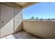 This private patio includes views, stucco wall construction, and neutral tone stone flooring at 4925 E Desert Cove Ave # 326, Scottsdale, AZ 85254