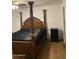 Spacious bedroom featuring a decorative four-poster bed and ample natural light, offering a serene retreat at 5708 S Beck Ave, Tempe, AZ 85283