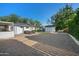 Spacious backyard with gravel, seating area, shed and grassy section at 5812 N 18Th Pl, Phoenix, AZ 85016