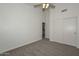 Bedroom featuring neutral carpet, a ceiling fan, and closet at 6623 N 85Th Ave, Glendale, AZ 85305