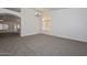 Bright living room with arched doorway and large windows at 6623 N 85Th Ave, Glendale, AZ 85305