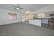 Bright, open-concept living room featuring stylish flooring and lots of natural light at 6623 N 85Th Ave, Glendale, AZ 85305