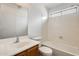 Bathroom featuring a light wood vanity and an alcove bathtub with white walls at 6830 W Desert Ln, Laveen, AZ 85339