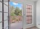 A view from the balcony showcasing the surrounding lush trees and clear blue sky at 7800 E Lincoln Dr # 2092, Scottsdale, AZ 85250