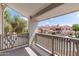 Balcony view showcasing lush trees and other condo buildings in the community at 7800 E Lincoln Dr # 2092, Scottsdale, AZ 85250