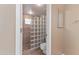 Bathroom featuring an enclosed glass block shower and updated tile flooring at 7800 E Lincoln Dr # 2092, Scottsdale, AZ 85250