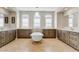 Luxurious bathroom showcasing a soaking tub, dual vanities, and decorative lighting at 9087 E Mountain Spring Rd, Scottsdale, AZ 85255