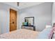 Comfortable bedroom featuring a dresser with mirror and stylish closet doors at 9087 E Mountain Spring Rd, Scottsdale, AZ 85255