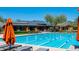 Large community pool with lap lanes and lounge chairs, perfect for swimming and relaxation at 9087 E Mountain Spring Rd, Scottsdale, AZ 85255