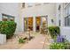 Picturesque courtyard with a fountain, landscaping, tiled patio, and access to the house at 9087 E Mountain Spring Rd, Scottsdale, AZ 85255
