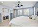 Inviting main bedroom with a cozy fireplace and bright natural light at 9087 E Mountain Spring Rd, Scottsdale, AZ 85255