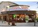Exterior view of Liberty Station American Tavern and Smokehouse, featuring outdoor seating and inviting ambiance at 9087 E Mountain Spring Rd, Scottsdale, AZ 85255