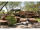 Community water feature showcasing artistic statues and lush landscaping for a peaceful atmosphere at 9087 E Mountain Spring Rd, Scottsdale, AZ 85255