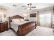 Spacious main bedroom with ceiling fan, carpet floors, and natural light at 9662 W Sunnyslope Ln, Peoria, AZ 85345