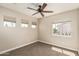 Inviting bedroom featuring neutral tones and multiple windows providing ample natural light at 1016 W Juanita Ave, Gilbert, AZ 85233