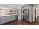 Modern kitchen features a stainless steel refrigerator and quartz countertops at 1016 W Juanita Ave, Gilbert, AZ 85233