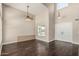 Bright living room featuring vaulted ceilings, hardwood floors, and natural light at 1016 W Juanita Ave, Gilbert, AZ 85233