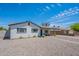 Charming single-story home with a well-maintained, low maintenance yard and covered parking at 1217 N 78Th St, Scottsdale, AZ 85257