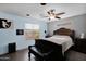 Large bedroom with views and a ceiling fan and furniture at 12841 W W . Via Camille --, El Mirage, AZ 85335