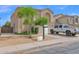 Two story home featuring a two car garage, neutral exterior paint, and desert landscaping, with truck parked on the driveway at 12841 W W . Via Camille --, El Mirage, AZ 85335
