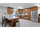 Spacious kitchen with custom cabinets, stainless steel appliances, granite countertops, and tile flooring at 12841 W W . Via Camille --, El Mirage, AZ 85335